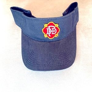 Men Blue cap with DFD fire Dept emblem. Visor hat